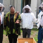 Trainees from Ethiopia along with CIP executive director, Palamattam, on a study-visit to a bee farm